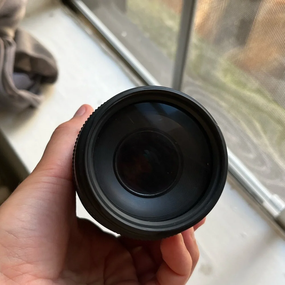Canon Camera with case, charger, zoom lens and SD card to Apple converter